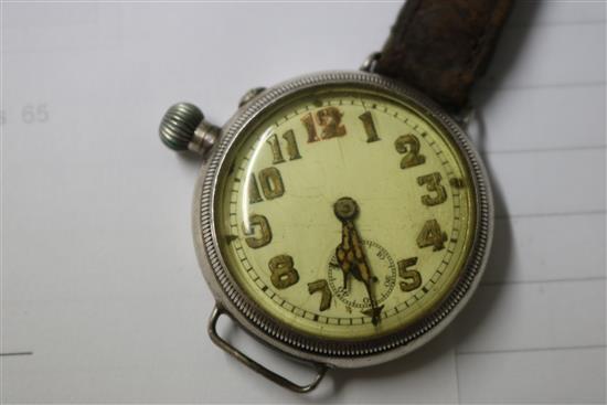 A ladys gold Rolex Precision watch and two other watches.